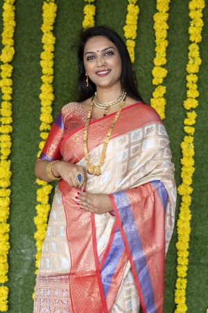 Cream color kanchipuram silk saree with zari work