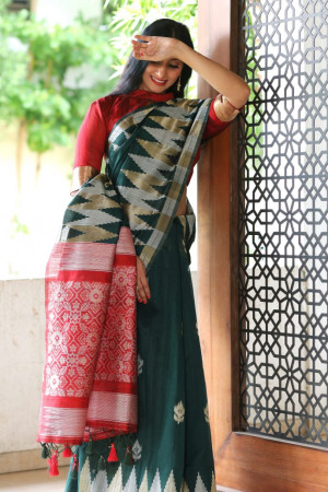 Green color tussar silk weaving saree with temple woven border
