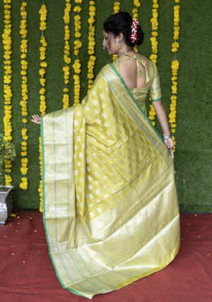parrot green color soft lichi silk saree with silver zari weaving work