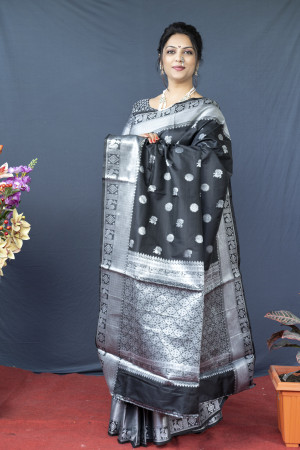 Black color soft lichi silk saree with silver zari woven work