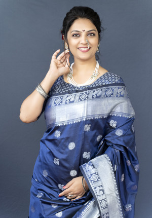 Navy blue color soft lichi silk saree with silver zari woven work