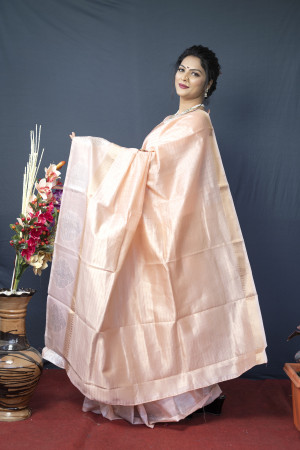 Peach color soft linen saree with golden and silver zari woven work