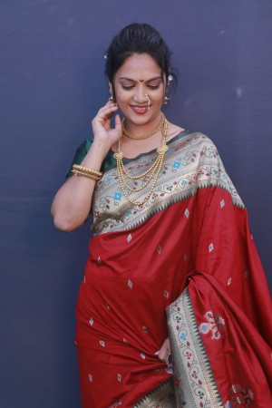 Red color paithani silk saree with golden zari work