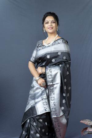 Black color soft lichi silk saree with silver zari woven work