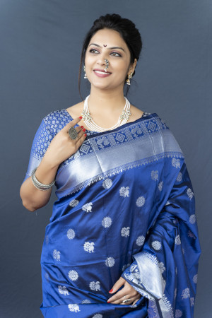 Royal blue color soft lichi silk saree with silver zari woven work