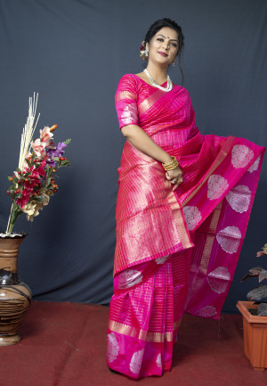 Pink color soft linen saree with golden and silver zari woven work