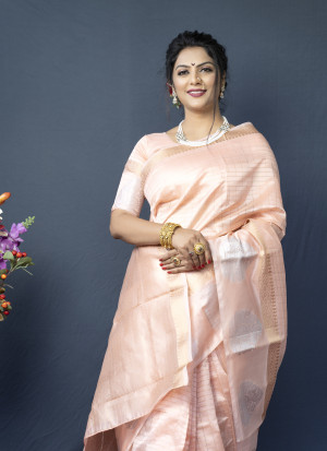 Peach color soft linen saree with golden and silver zari woven work