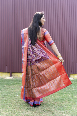 Magenta color kanchipuram silk saree with zari work
