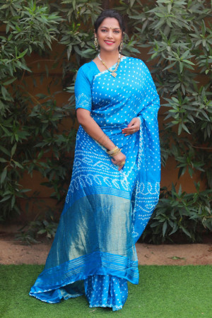 Firoji color pure bandhej silk saree with zari weaving work