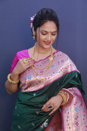 Green color paithani silk saree with golden zari work