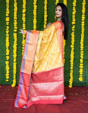 Yellow color kanchipuram silk saree with zari work