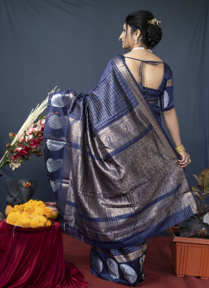 Navy blue color soft linen silk saree with golden zari weaving work