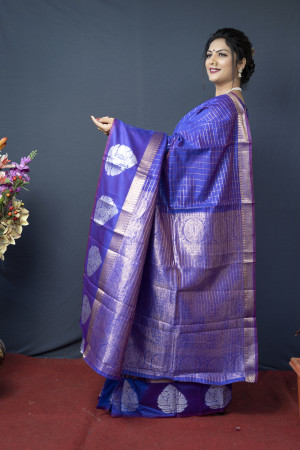 Violet color soft linen saree with golden and silver zari woven work
