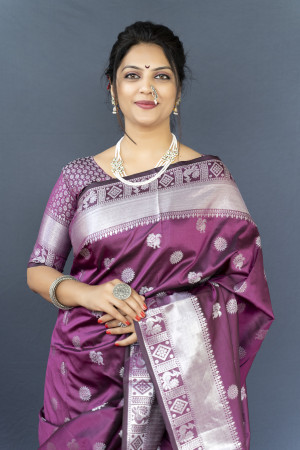 Magenta color soft lichi silk saree with silver zari woven work