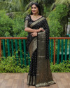 Black color hand bandhej silk saree with zari weaving work