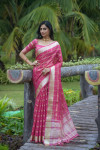 Rani pink color organza silk saree with zari weaving work