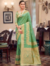 Pista green color kanchipuram silk saree with zari weaving work