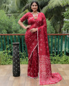 Maroon color bandhej silk saree with printed work