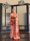 Light Peach color banarasi silk saree with woven design