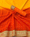 Yellow and orange color georgette saree with foil printed work