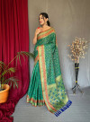 Water green color patola silk saree with woven design