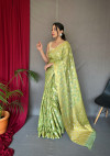 Light olive green color soft cotton saree with zari weaving work