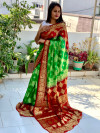 Green and maroon color soft art silk saree with zari weaving work