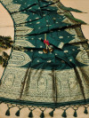 Bottle green color tussar silk saree with zari woven work