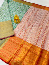 Sea green color kanchipuram silk saree with woven design