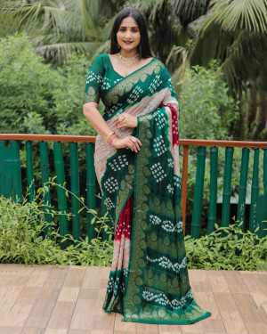 Beige and green color bandhej silk saree with zari weaving work