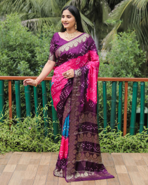 Pink and magenta color bandhej silk saree with zari weaving work