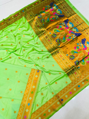 Light olive green color paithani silk saree with zari weaving work