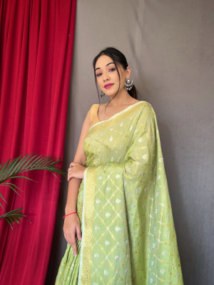 Pista green color muslin silk saree with zari weaving work