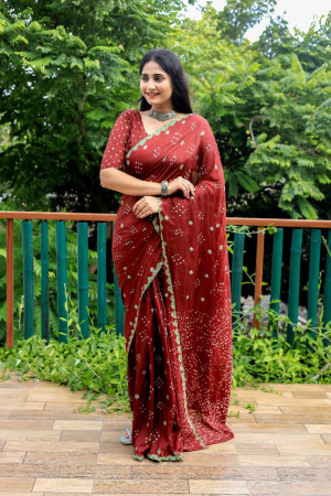 Maroon color soft bandhej silk saree with sequence work