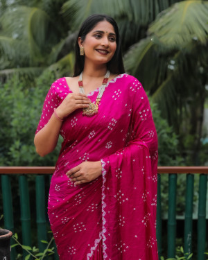 Rani pink color bandhej silk saree with printed work