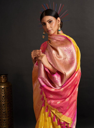 Yellow color organza silk saree with woven design