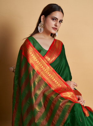 Dark green color cotton silk saree with zari weaving work