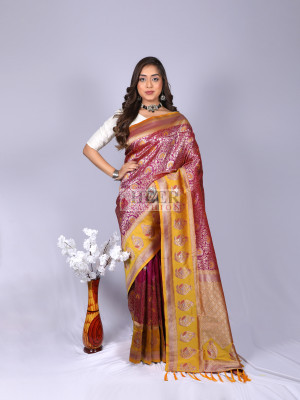 Magenta color kanchipuram silk saree with zari weaving work