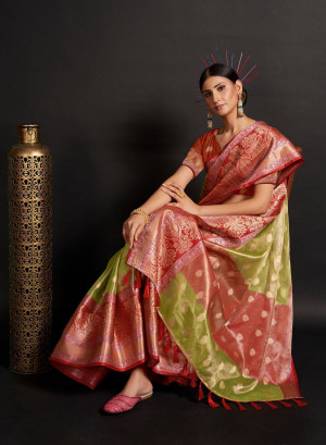 Green and red color organza silk saree with woven design