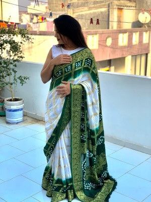 White and green color bandhej silk saree with zari weaving work