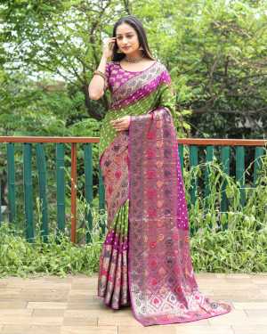 Mahendi green and purple color hand bandhej silk saree with zari weaving work