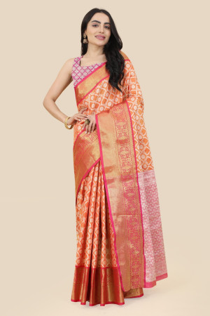 Orange color tissue silk saree with woven design