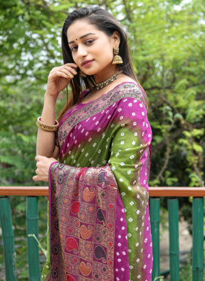 Mahendi green and purple color hand bandhej silk saree with zari weaving work