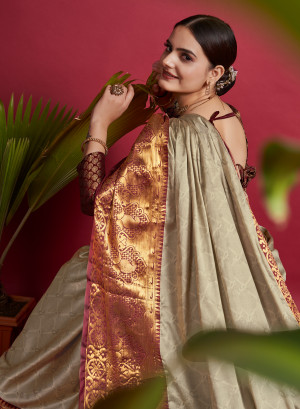 Beige color cotton silk saree with zari woven work