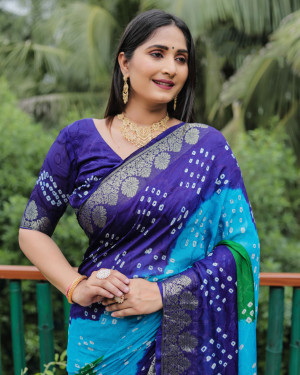 Sky blue and blue color bandhej silk saree with zari weaving work