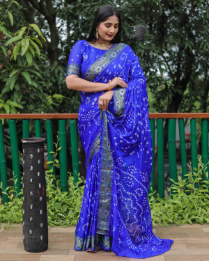 Royal blue color bandhej silk saree with zari weaving work