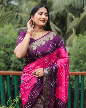 Pink and magenta color bandhej silk saree with zari weaving work