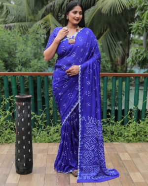 Royal blue color bandhej silk saree with printed work