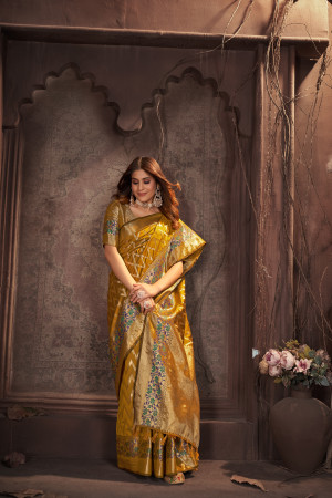 Mustard yellow color banarasi silk saree with zari weaving work