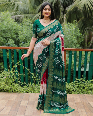 Beige and green color bandhej silk saree with zari weaving work